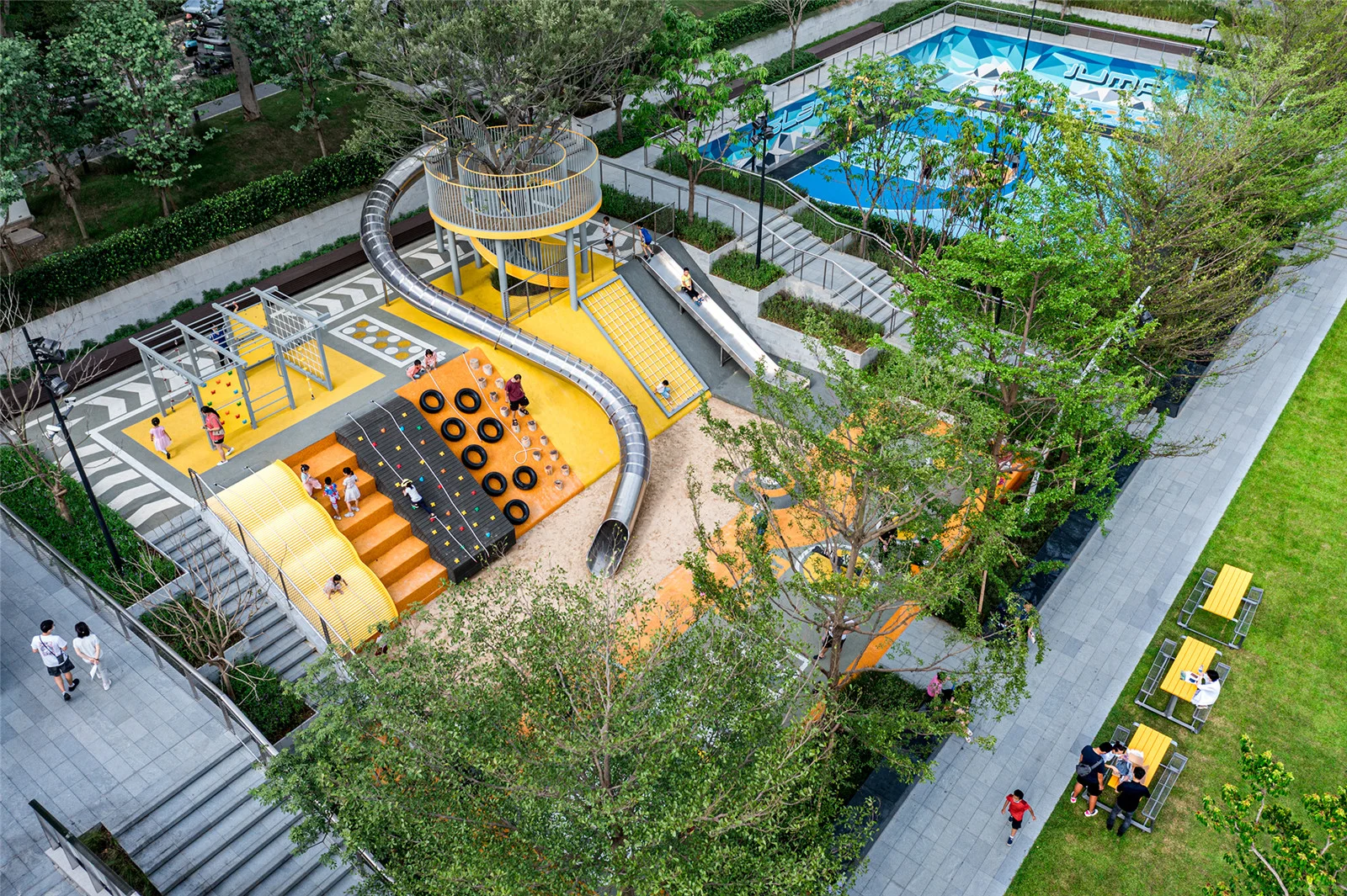 Multi-Level Adventure Playground with Stainless Steel Slide in Galvanized Steel & HDPE featuring a spiral slide for Singapore