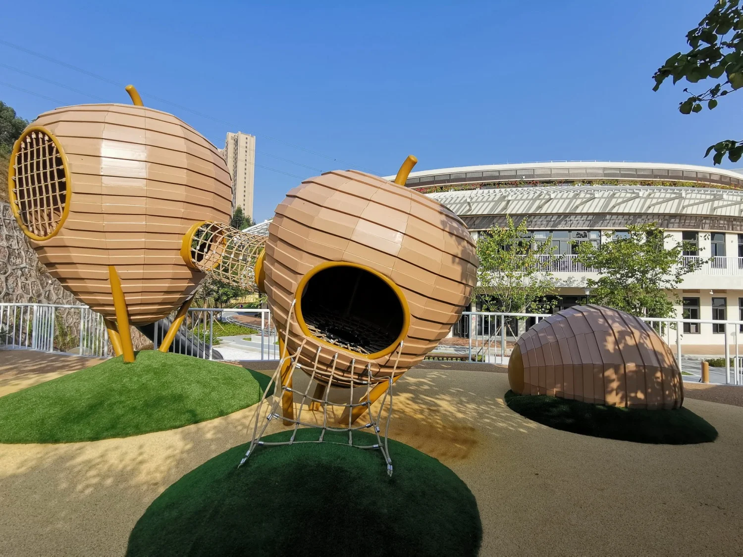 Acorn-Inspired Adventure Pod Galvanized Steel & HDPE dual pod system with rope bridge for Singapore