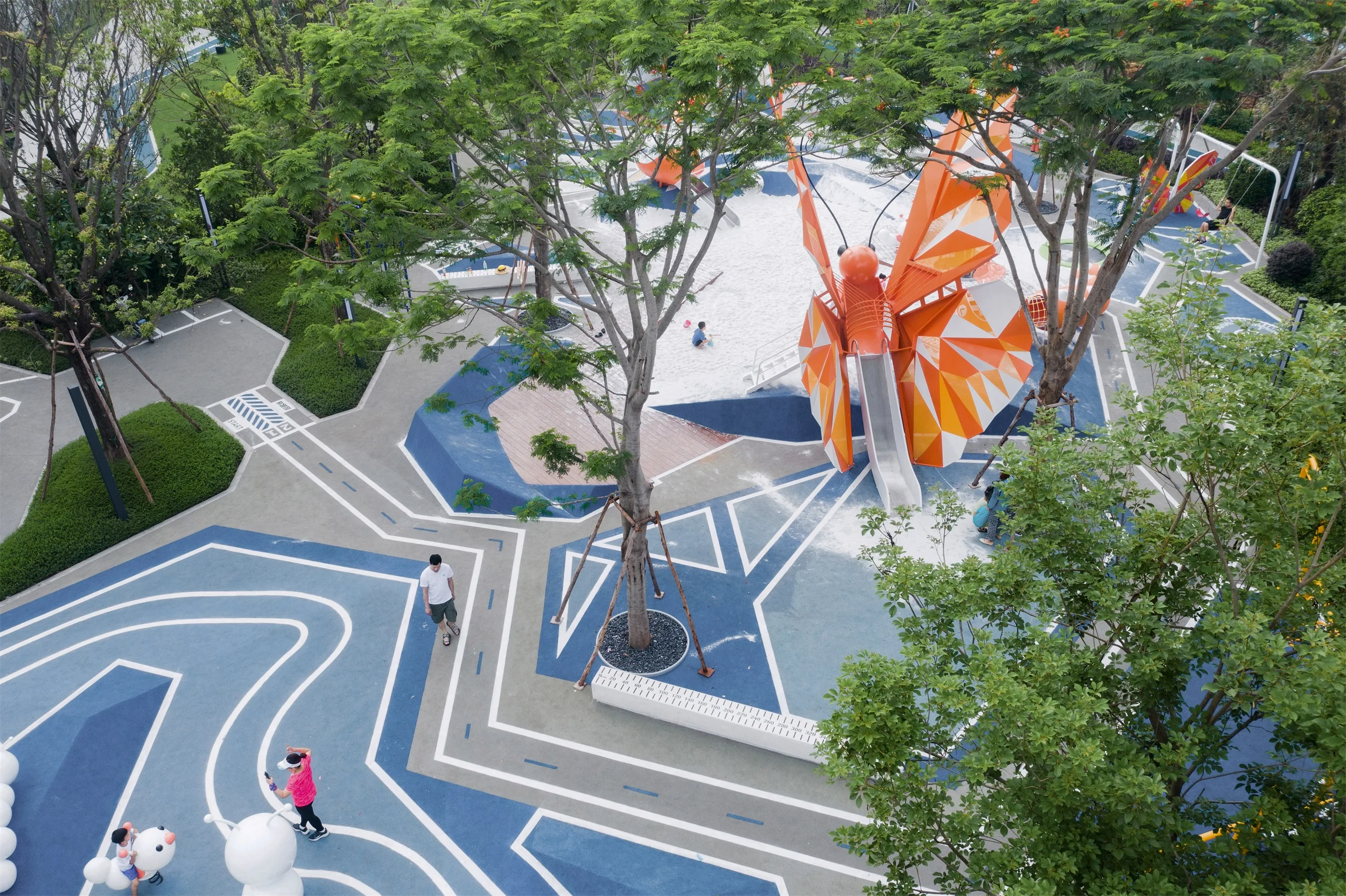 Butterfly Theme Outdoor Playground made of Galvanized Steel & HDPE with an aerial view of the butterfly slide for Singapore urban parks