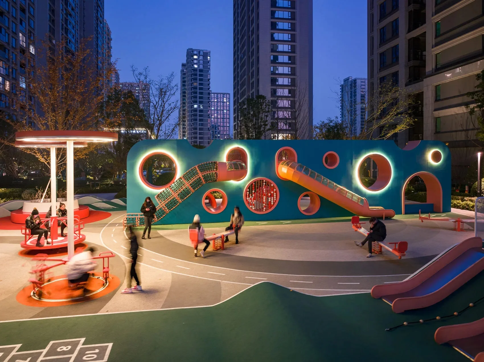 Adventure Mound Playground Galvanized Steel & HDPE illuminated blue play wall with slides and tunnels for Singapore