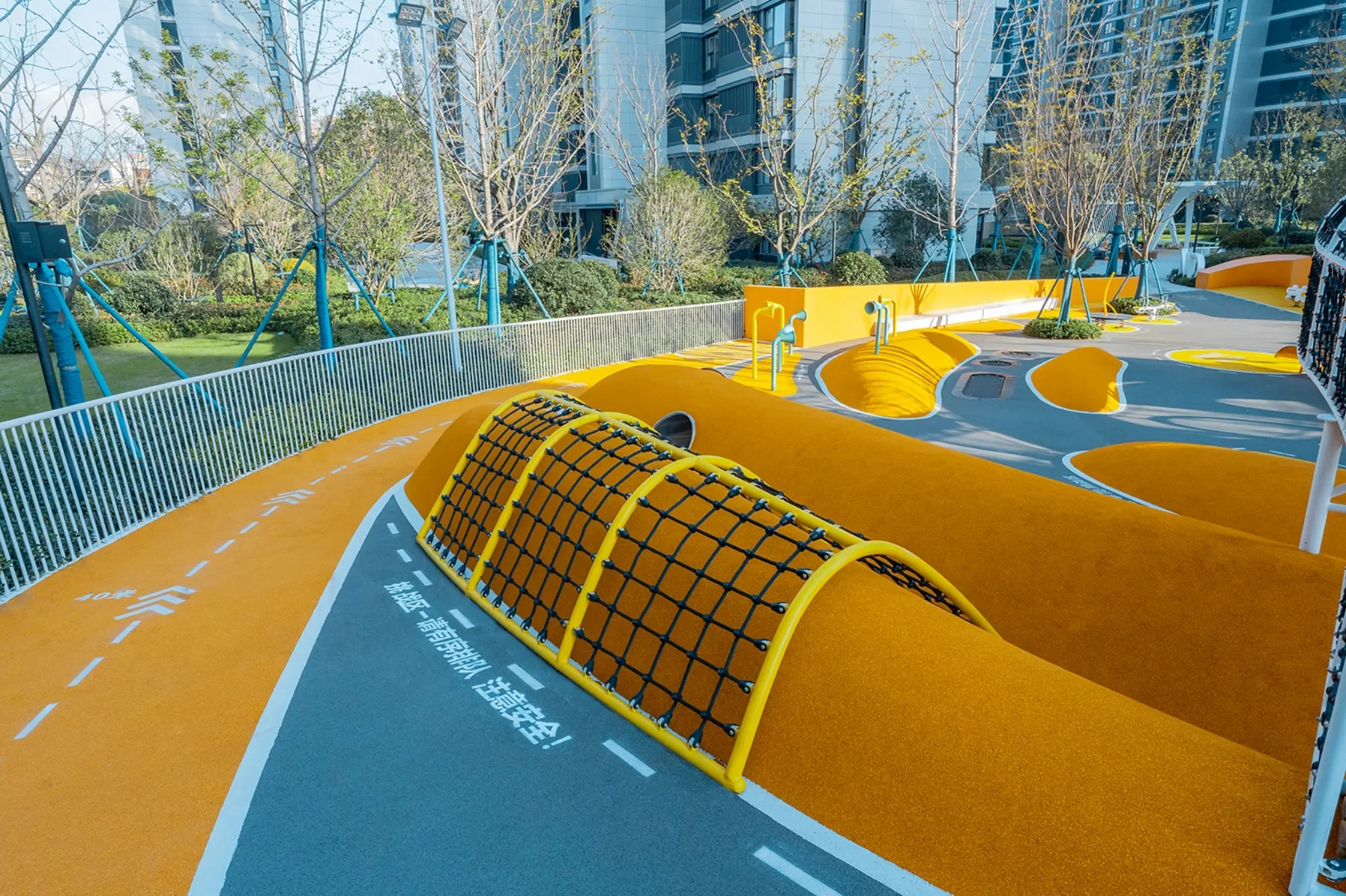 Adventure Mound Playground Galvanized Steel & HDPE yellow climbing net on orange rubber mound for Singapore