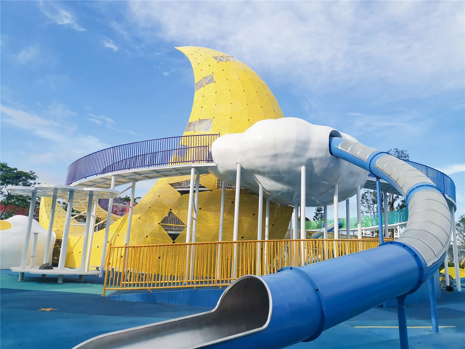 Moon & Cloud Themed Outdoor Playground, Galvanized Steel & HDPE, whimsical cloud platforms and blue tube slide for Dubai urban parks.