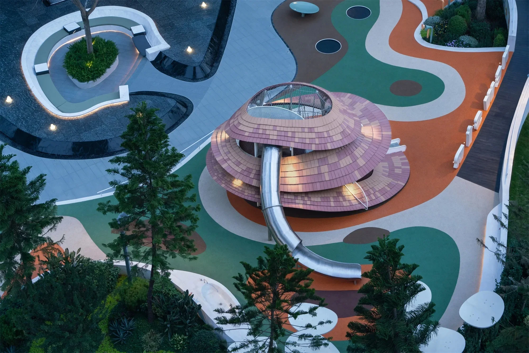 Tiered Shell Architectural Playground Galvanized Steel & HDPE aerial view of layered structure and slide for Singapore
