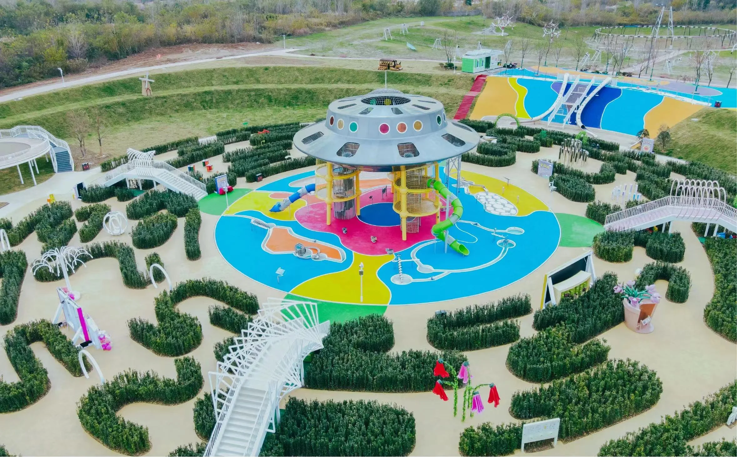 UFO Theme Outdoor Playground galvanized steel and synthetic turf integrated spiral slides and climbing structures for Singapore