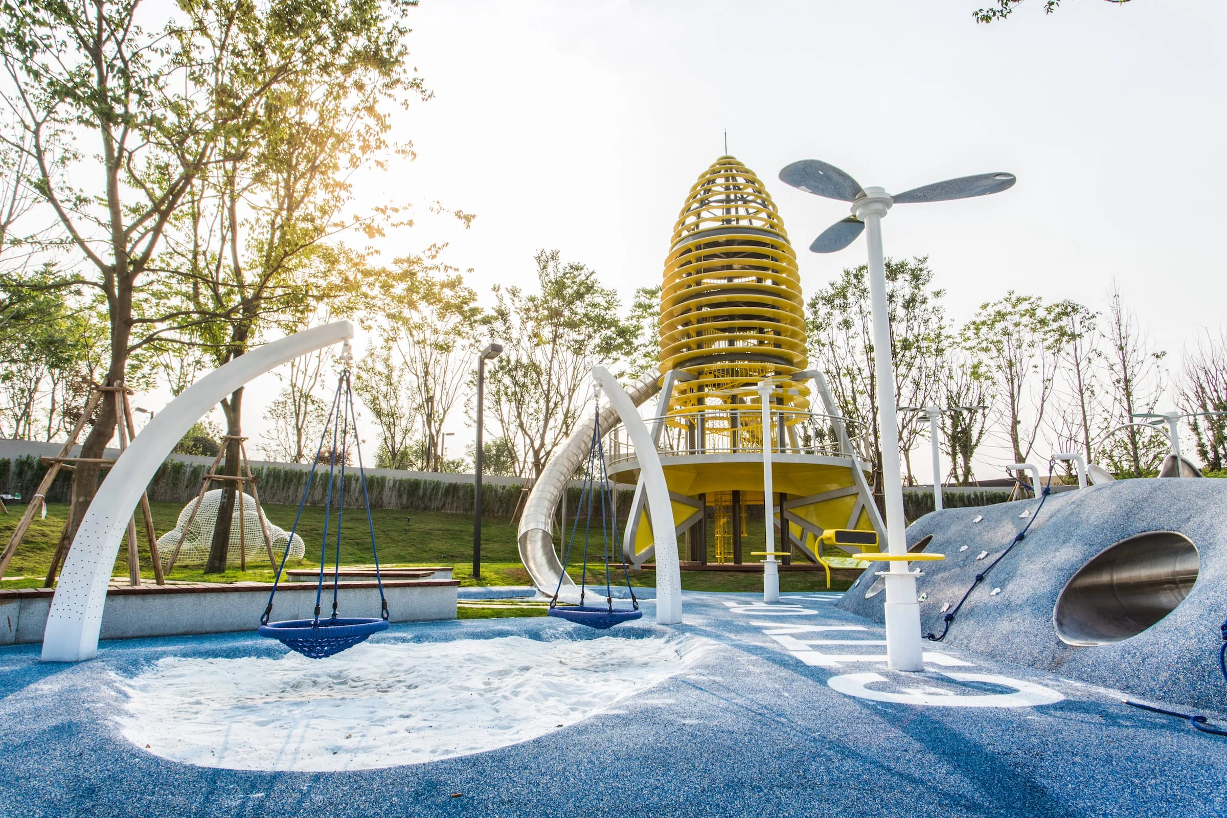 Rocket Tower Playground Galvanized Steel & HDPE dual blue nest swings and climbing mound tunnel for Singapore urban parks