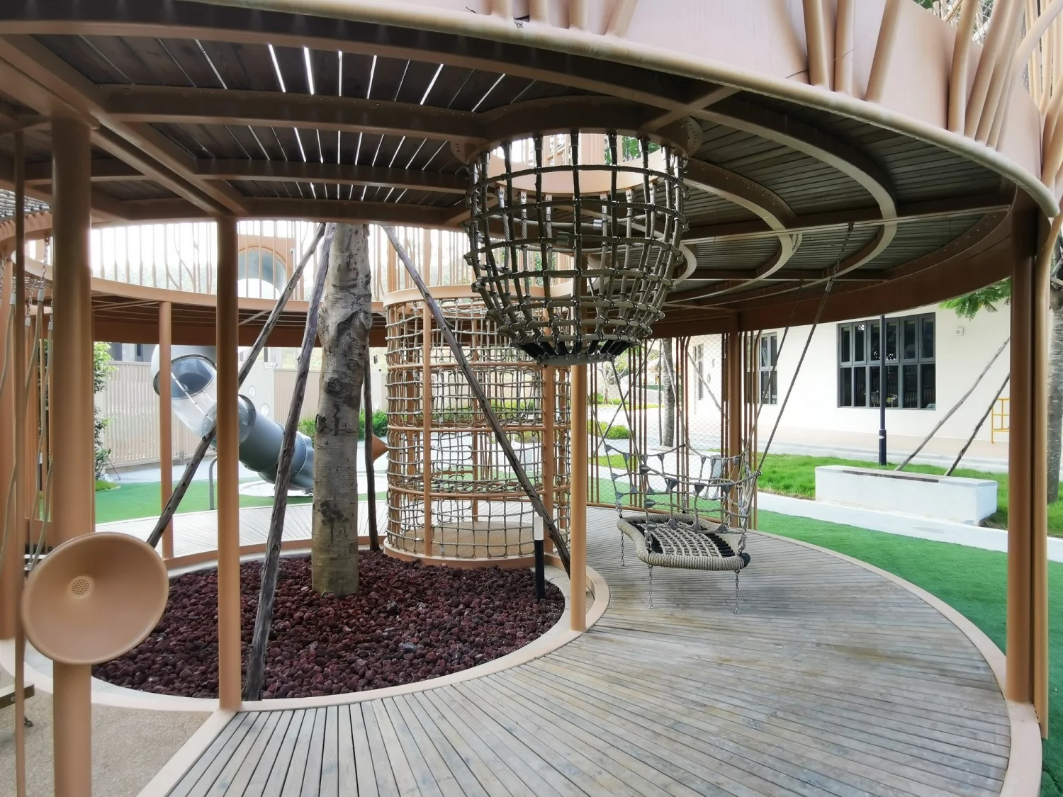 Custom Nature-Themed Treehouse Playground galvanized steel and weather-resistant wood rope climbing basket and swing for Singapore
